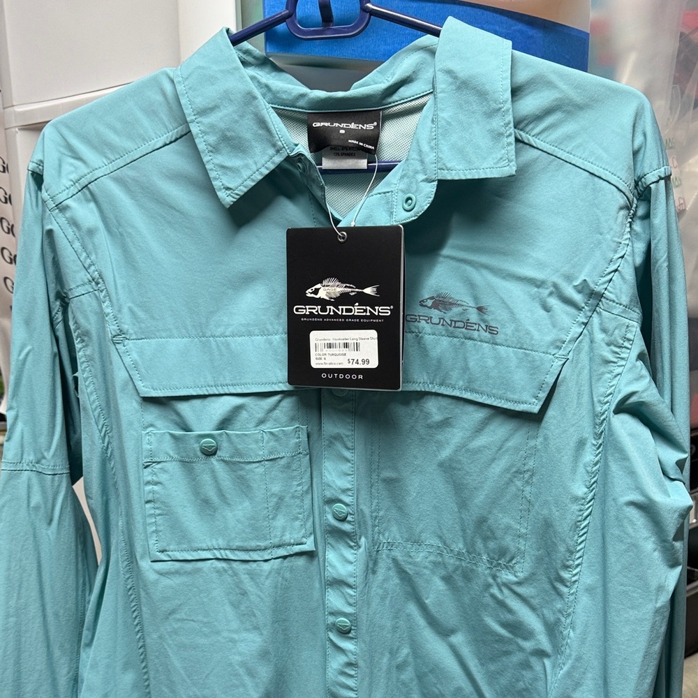 Grundens Men's Teal Jacket, great for fishing.